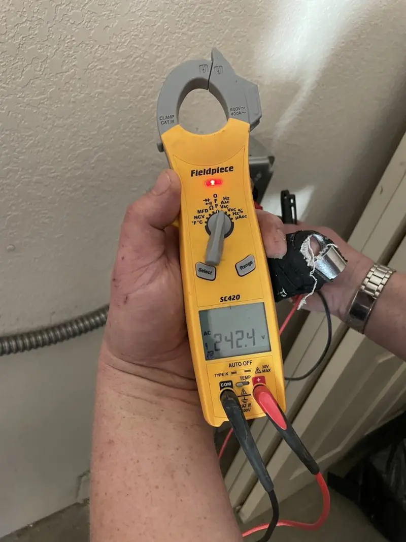 Voltage testing with clamp meter during Generator Installation in San Luis